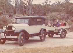 Plymouth with trailer circa 1970